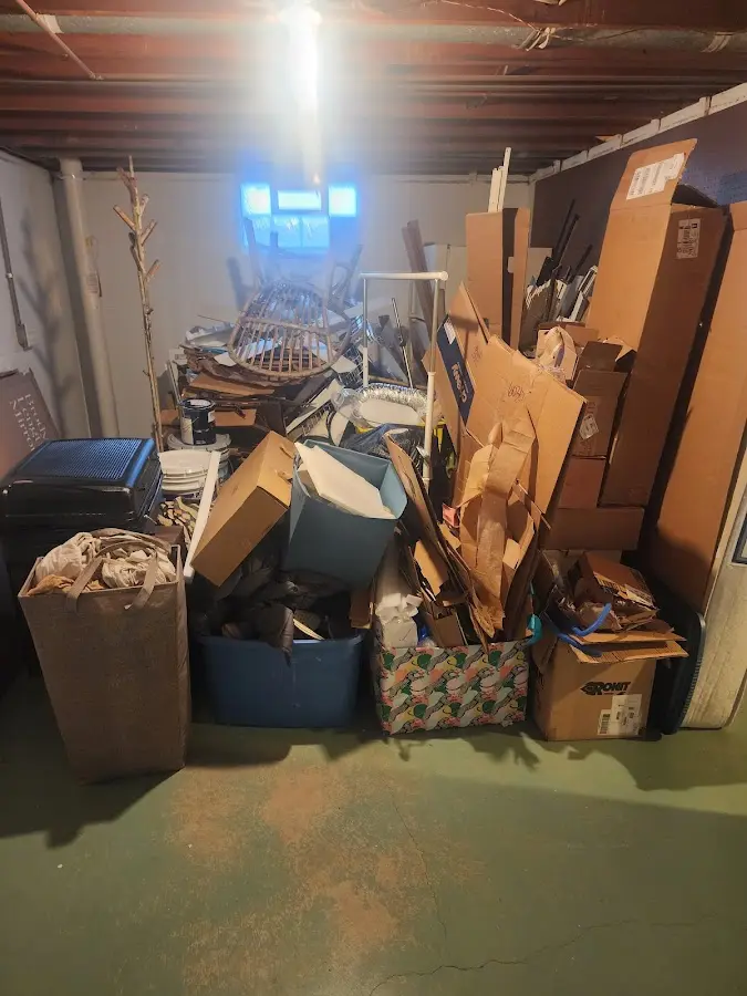 Roll-off dumpster container at job site for Yard Waste Dumpster Rental in Saks